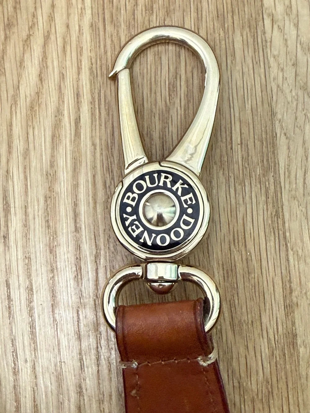 Dooney & Bourke Cream/Brown Signature Logo Lock Canvas Hobo Shoulder Bag